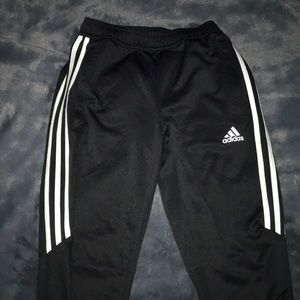 Adidas track pants.